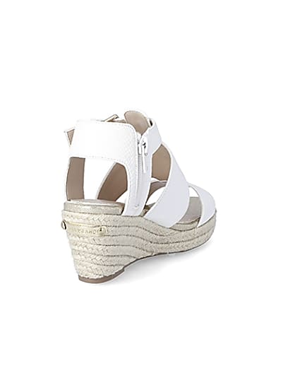 360 degree animation of product Girls white strappy wedge sandals frame-11