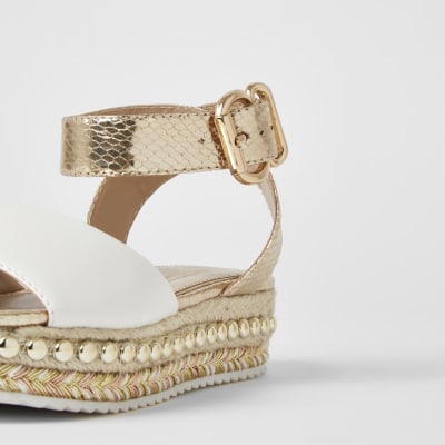 white studded flatforms