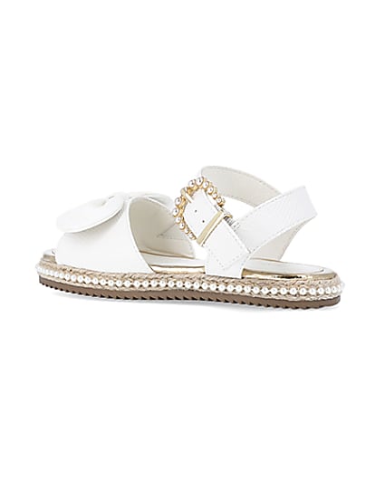 360 degree animation of product Girls White Wide Fit Pearl Bow Sandals frame-5
