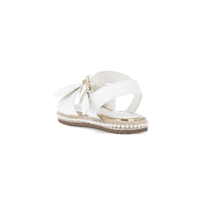 360 degree animation of product Girls White Wide Fit Pearl Bow Sandals frame-7