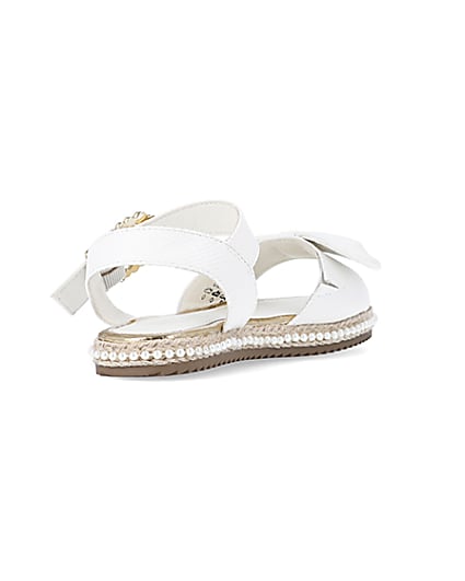 360 degree animation of product Girls White Wide Fit Pearl Bow Sandals frame-11