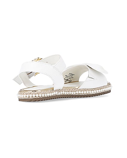 360 degree animation of product Girls White Wide Fit Pearl Bow Sandals frame-12
