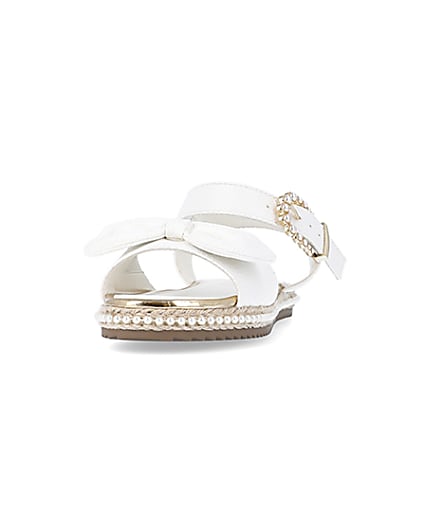 360 degree animation of product Girls White Wide Fit Pearl Bow Sandals frame-22