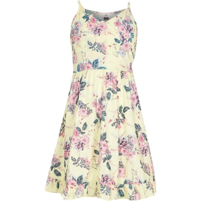 Girls yellow floral wrap dress River Island
