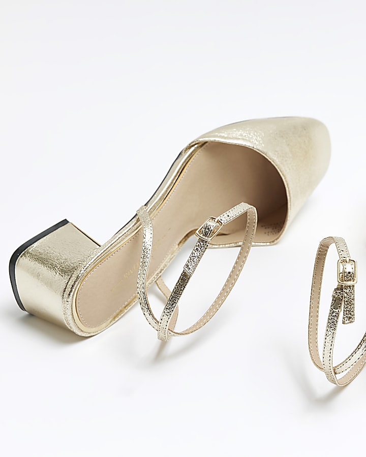 Gold block heeled court shoes