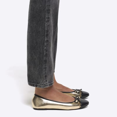 Gold bow ballet shoes