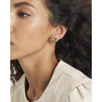 Gold bow stud earrings