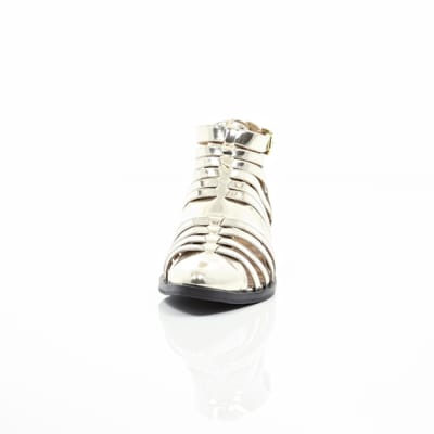360 degree animation of product Gold closed toe gladiator sandals frame-3