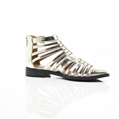 360 degree animation of product Gold closed toe gladiator sandals frame-8