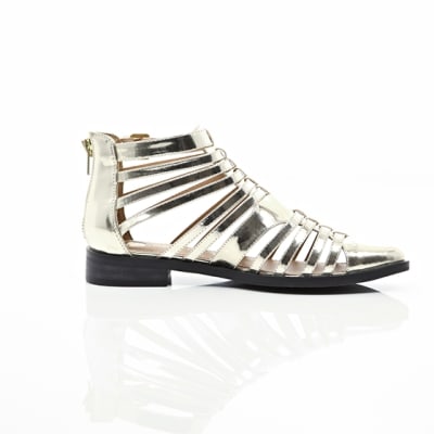 360 degree animation of product Gold closed toe gladiator sandals frame-9
