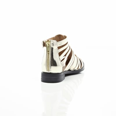 360 degree animation of product Gold closed toe gladiator sandals frame-14