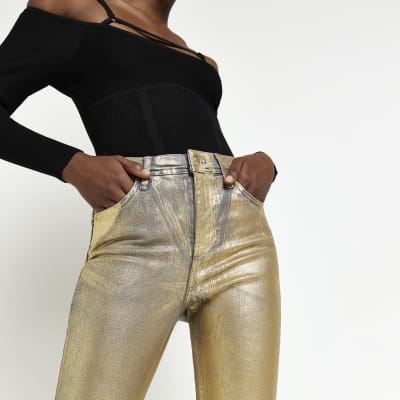 Llevar diferente a Otros lugares Gold coated high waisted skinny jeans | River Island