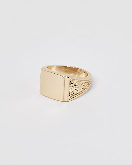 Gold colour engraved signet ring