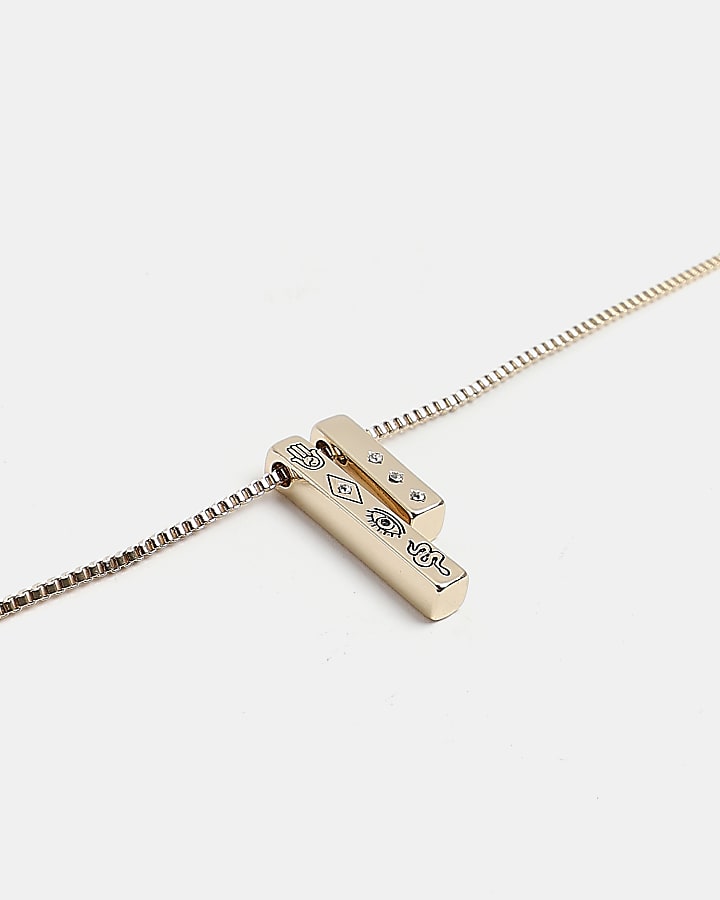 Gold colour engraved stick pendant necklace