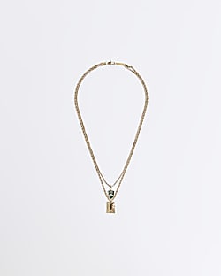 Gold colour shield and tag multirow necklace
