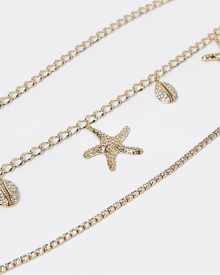 Gold colour starfish and shell belly chain