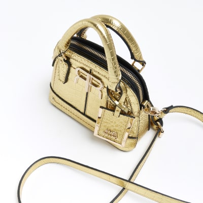 Gold croc embossed mini cross body bag River Island