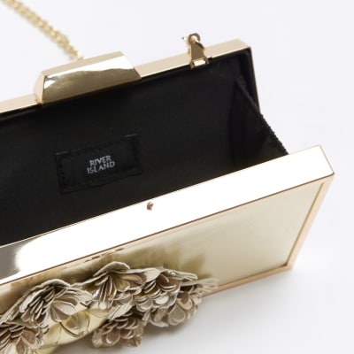 River island rose top gold clutch bag