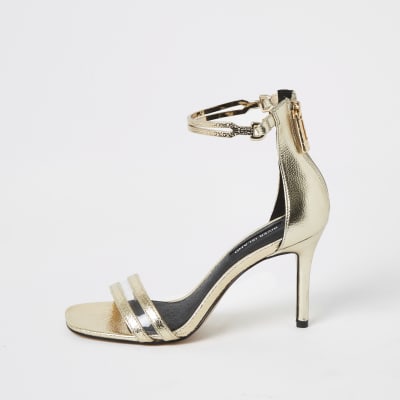 Gold high heel ankle cuff sandal 