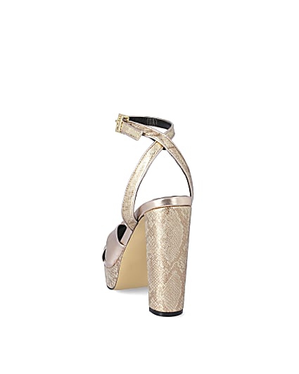 360 degree animation of product Gold knot front platform heeled sandal frame-8