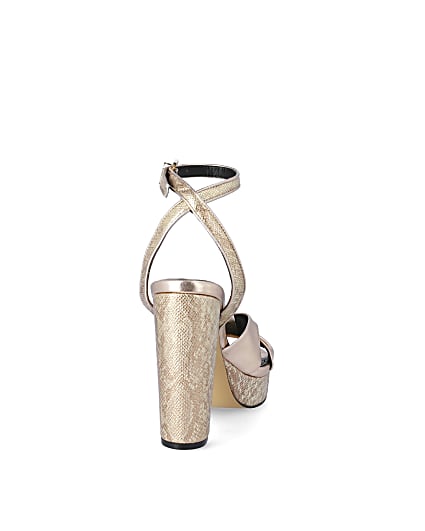 360 degree animation of product Gold knot front platform heeled sandal frame-10
