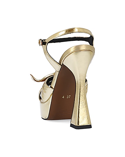 360 degree animation of product Gold knot platform heeled sandals frame-8