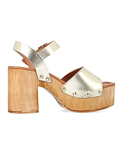 360 degree animation of product Gold leather heeled clogs frame-14