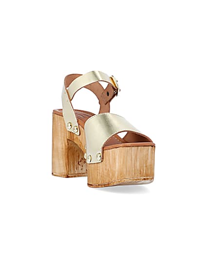 360 degree animation of product Gold leather heeled clogs frame-19