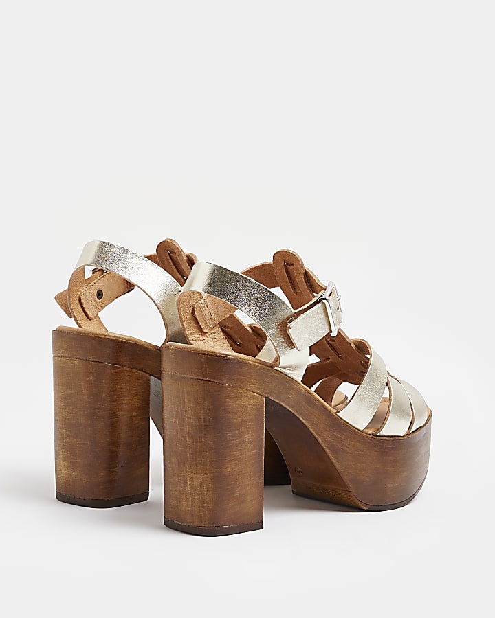 Gold leather platform heeled sandals