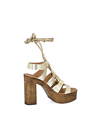 360 degree animation of product Gold leather tie up platform sandals frame-14