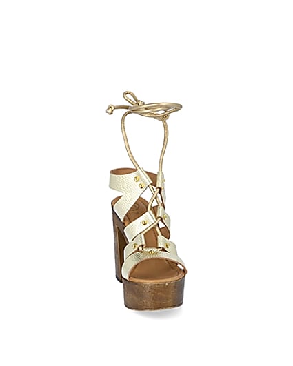 360 degree animation of product Gold leather tie up platform sandals frame-20