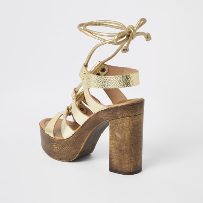 Gold leather tie up platform sandals