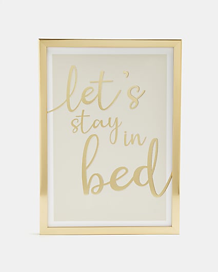 Gold 'Lets Stay In Bed' framed print