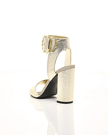 360 degree animation of product Gold metallic block heel sandals frame-18