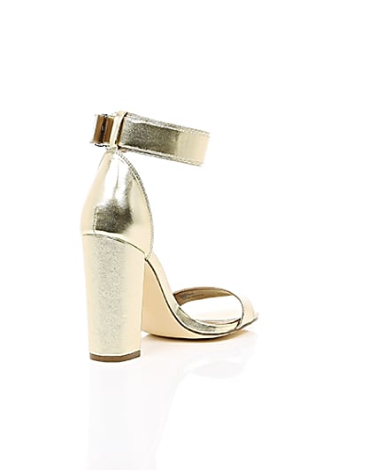 360 degree animation of product Gold metallic buckle block heel sandals frame-13