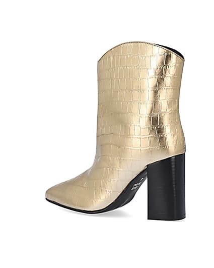 360 degree animation of product Gold metallic croc embossed ankle boots frame-5