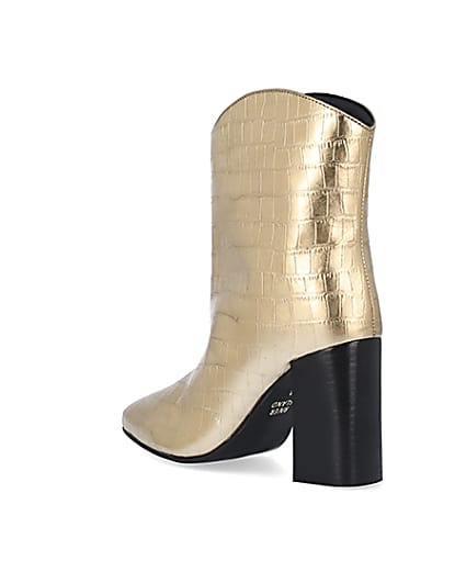 360 degree animation of product Gold metallic croc embossed ankle boots frame-6