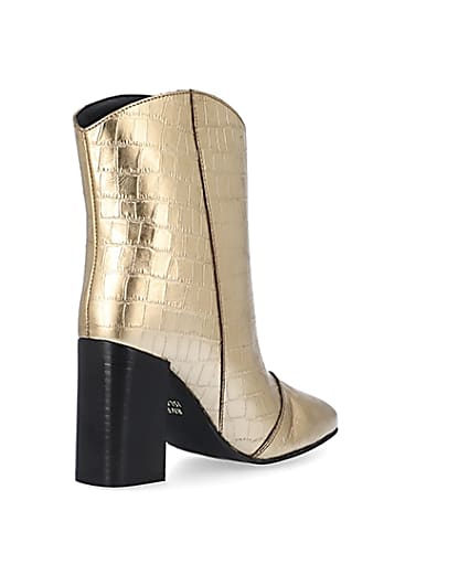 360 degree animation of product Gold metallic croc embossed ankle boots frame-12