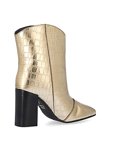 360 degree animation of product Gold metallic croc embossed ankle boots frame-13