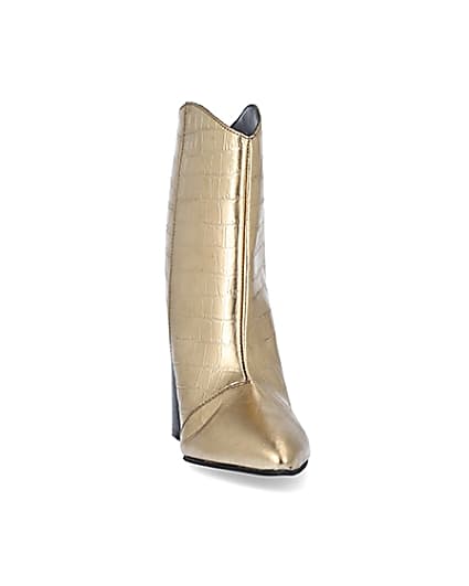 360 degree animation of product Gold metallic croc embossed ankle boots frame-20