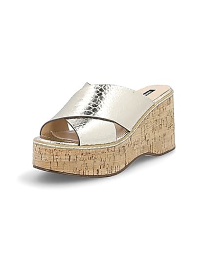 360 degree animation of product Gold metallic cross Strap wedges frame-0
