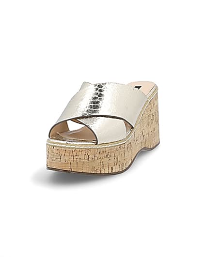 360 degree animation of product Gold metallic cross Strap wedges frame-23