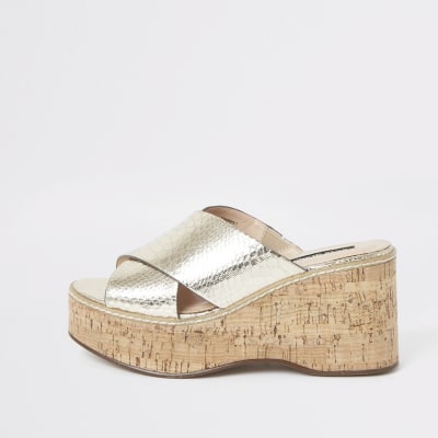 Gold metallic cross Strap wedges | River Island