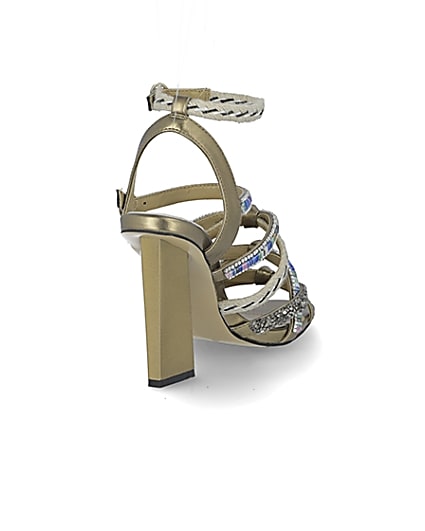 360 degree animation of product Gold metallic embellished strappy sandals frame-11