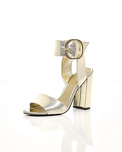 360 degree animation of product Gold metallic wide fit block heel sandals frame-0