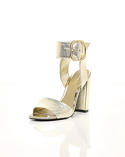 360 degree animation of product Gold metallic wide fit block heel sandals frame-1