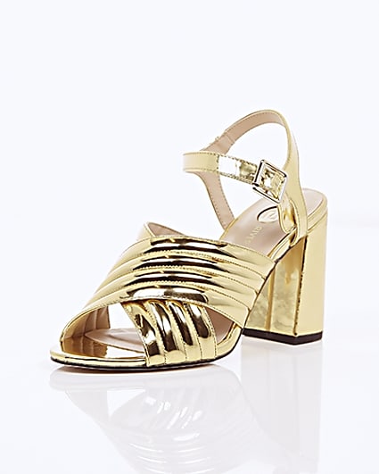 360 degree animation of product Gold patent cross strappy heels frame-1
