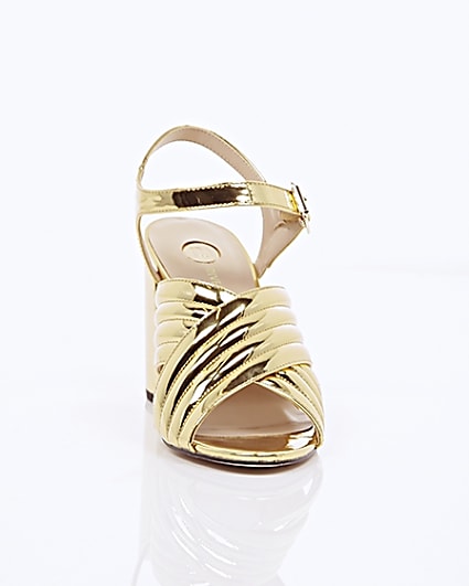360 degree animation of product Gold patent cross strappy heels frame-5