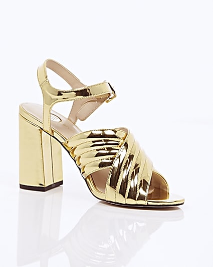 360 degree animation of product Gold patent cross strappy heels frame-8