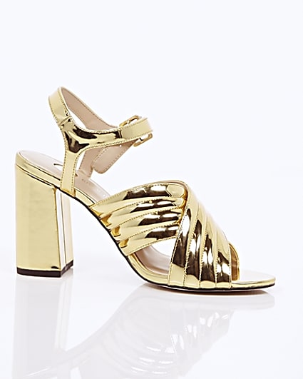 360 degree animation of product Gold patent cross strappy heels frame-9